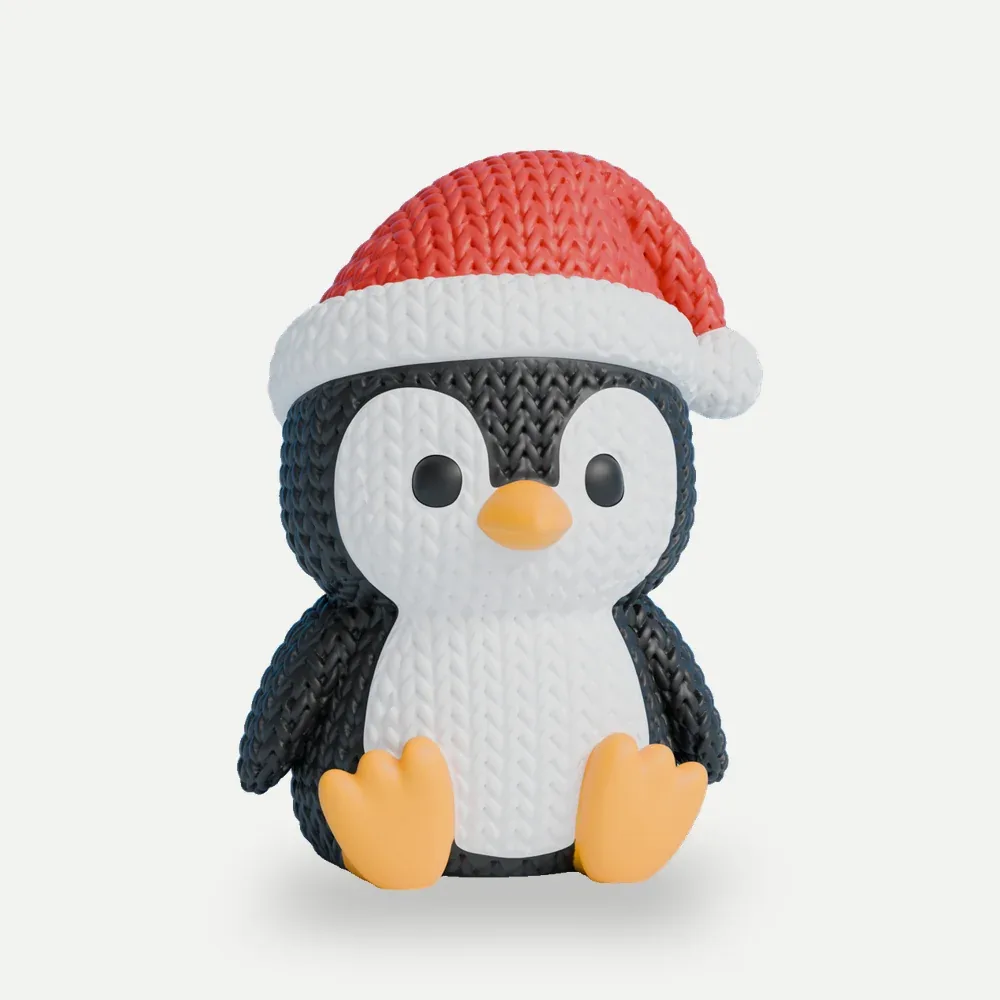 Pinguim tricô com gorro de Natal